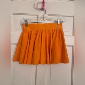 Aritzia TNAction Pleated Skirt Orange Small